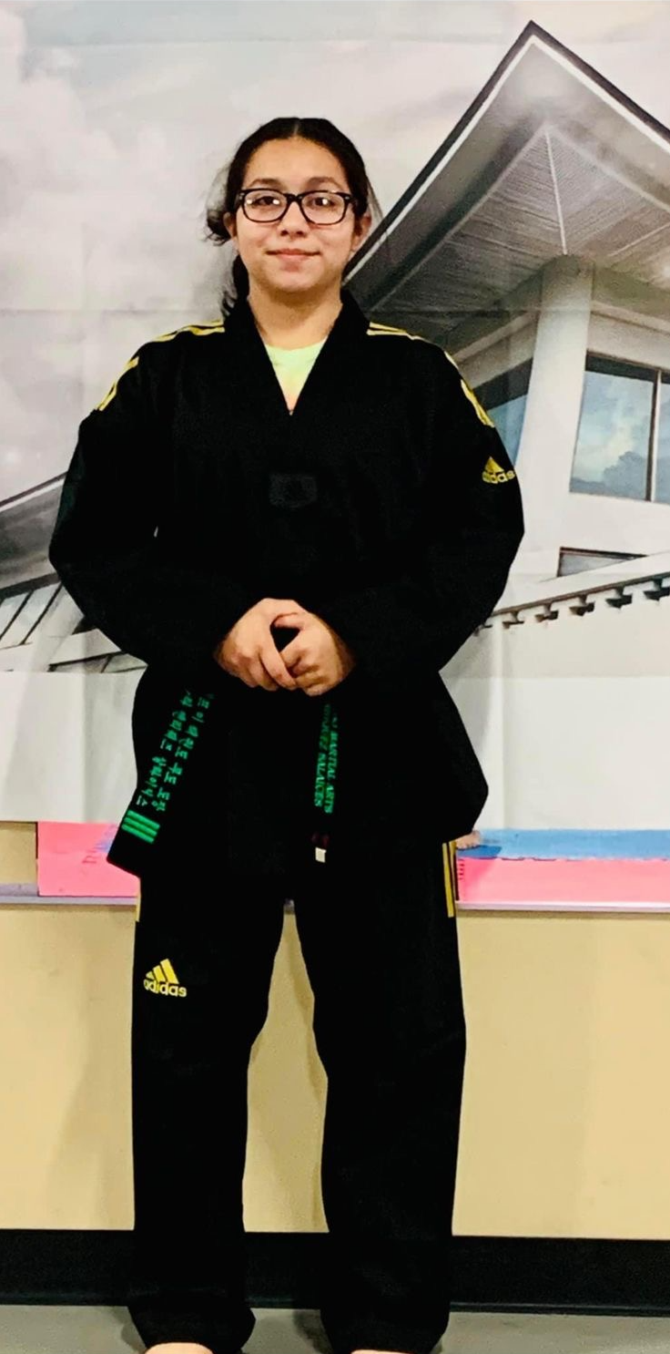 Instructor Eldie Ara demonstrating martial arts technique